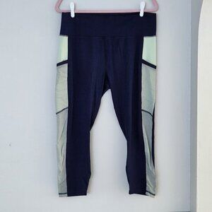 Fabletics On the Go PowerHold Capri Leggings –  XXL - Deep Navy/Aloe Green